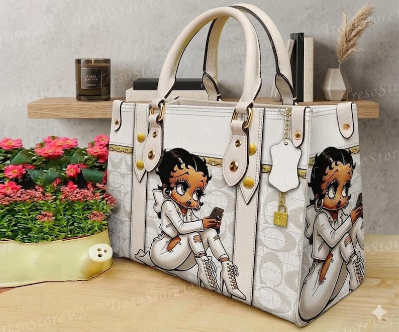 Product Title
Custom Betty Boop Print White Large Capacity Leather Tote Bag Women's Fashion Casual Top-handle Handbag With Delicate Stitching Metal Buckle, Ideal Matching Accessory for Custom Air Force 1 Custom Sneakers